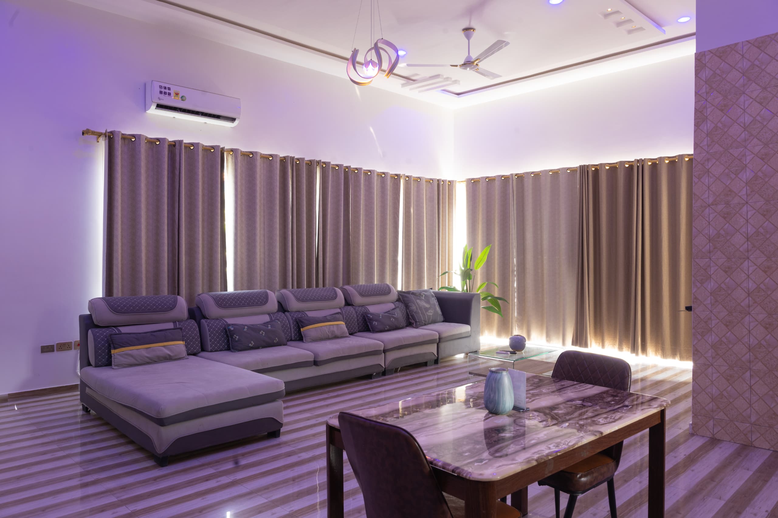Luxury lounge with purple ambient lighting