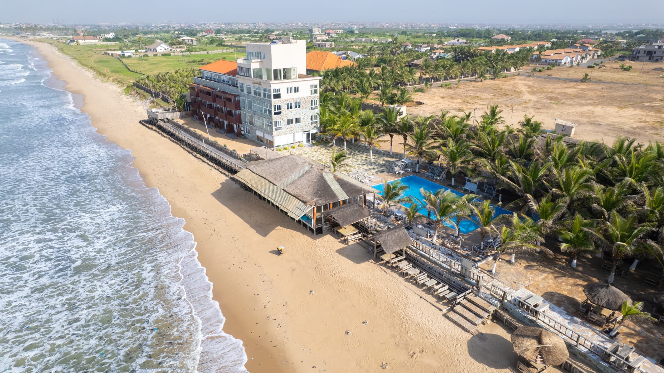 Aerial view of resort with pools and grounds