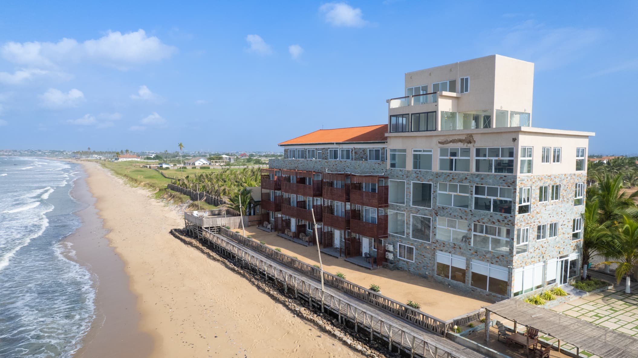 Resort building with red brick and stone facade