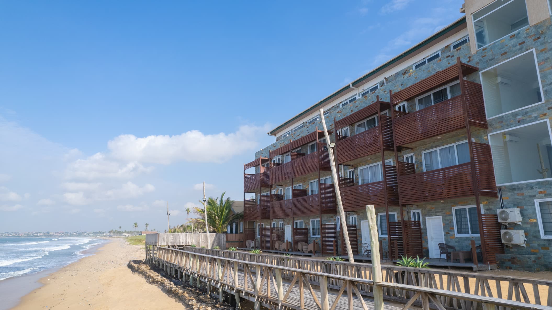 Beachfront building with wooden slat design